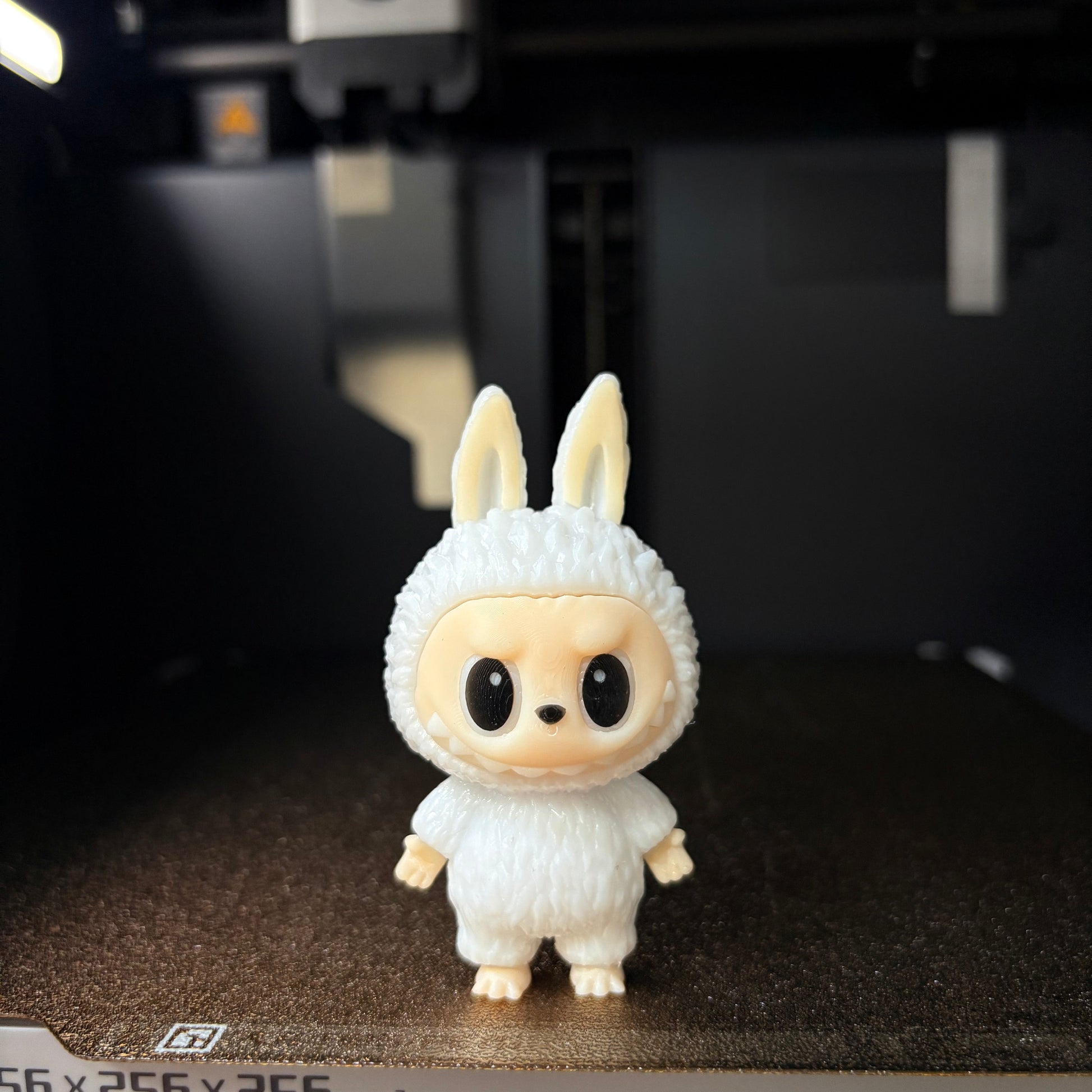 The cute white constant seller labubu of the mini version