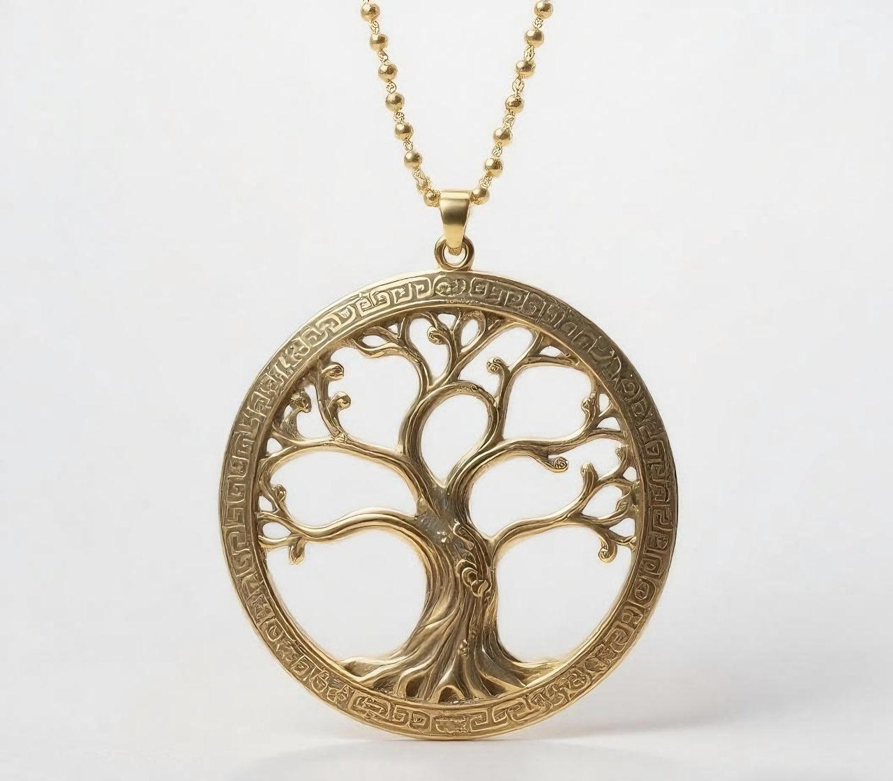 Gold peace tree cut-out necklace